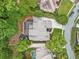 Aerial view shows the backyard and deck with a playground and pool at 5705 Registry Oaks Se Ln, Mableton, GA 30126