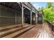 Enclosed stained wood deck features railings, stairs, and a lattice wall at 5705 Registry Oaks Se Ln, Mableton, GA 30126