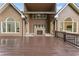 Large deck with a stone fireplace between both sections of the house creates a beautiful outdoor entertainment space at 5705 Registry Oaks Se Ln, Mableton, GA 30126