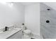 Modern bathroom features marble floors, a sleek vanity, and a stand-up shower at 5705 Registry Oaks Se Ln, Mableton, GA 30126