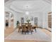 Bright dining room with a modern chandelier and neutral decor, perfect for entertaining at 5705 Registry Oaks Se Ln, Mableton, GA 30126