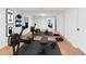 Bright gym featuring modern equipment, mirrored wall, and access to another room at 5705 Registry Oaks Se Ln, Mableton, GA 30126