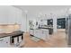 Bright and spacious kitchen featuring an island with white countertops and stainless steel appliances at 5705 Registry Oaks Se Ln, Mableton, GA 30126
