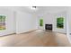 Open living space boasts recessed lighting, hardwood floors, and lots of natural light at 5705 Registry Oaks Se Ln, Mableton, GA 30126