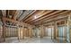 Unfinished basement with wooden framing, awaiting customization and design at 771 Tate Overlook, Marietta, GA 30064