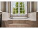 A view of the bathtub and window at 771 Tate Overlook, Marietta, GA 30064