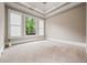 View of the bedroom with large windows, carpet, and white trim at 771 Tate Overlook, Marietta, GA 30064
