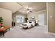 Relaxing bedroom with soft carpet, neutral tones, ceiling fan, and lots of natural light at 771 Tate Overlook, Marietta, GA 30064