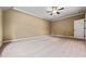 Large bedroom offers neutral walls and plush carpeting, ready for your personal touch at 771 Tate Overlook, Marietta, GA 30064