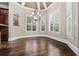 Elegant dining area with hardwood floors, plantation shutters, and a stylish chandelier at 771 Tate Overlook, Marietta, GA 30064
