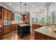 Bright kitchen featuring stainless appliances, granite counters, and hardwood floors at 771 Tate Overlook, Marietta, GA 30064