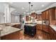 Spacious kitchen with granite countertops, stainless steel appliances, and hardwood floors at 771 Tate Overlook, Marietta, GA 30064