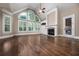 Spacious living room with fireplace, large windows, and vaulted ceilings at 771 Tate Overlook, Marietta, GA 30064