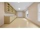 Storage room includes built-in shelves and cabinets for maximum organization and utility at 771 Tate Overlook, Marietta, GA 30064