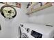 The laundry room features modern appliances and convenient storage solutions at 1701 English Ivey Nw Ln, Kennesaw, GA 30144
