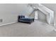 Large bedroom features a vaulted ceiling, arch window, neutral walls, and plush carpet at 5090 Eubanks Rd, Woodstock, GA 30188