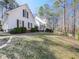 Exterior of home with lawn, driveway, and covered front porch at 5090 Eubanks Rd, Woodstock, GA 30188
