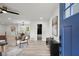 Bright foyer with hardwood floors, modern decor, and an open layout at 569 Oakside Sw Dr, Atlanta, GA 30331