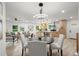 Open concept living room featuring modern furnishings and an island overlooking the kitchen at 569 Oakside Sw Dr, Atlanta, GA 30331