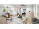 Comfortable living room flows into dining area; great layout for entertaining at 569 Oakside Sw Dr, Atlanta, GA 30331
