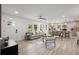 Open-concept living area with modern furnishings, neutral tones, and ample natural light at 569 Oakside Sw Dr, Atlanta, GA 30331