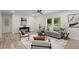 Cozy living room featuring a comfortable sofa, stylish decor, and plenty of natural light at 569 Oakside Sw Dr, Atlanta, GA 30331