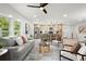 Open concept living room featuring modern furnishings and an island overlooking the kitchen at 569 Oakside Sw Dr, Atlanta, GA 30331