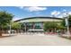 View of the Infinite Energy Arena, showing the modern architecture and entrance area on a sunny day at 775 Tribble Cove Dr, Lawrenceville, GA 30045