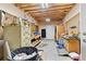 Unfinished basement with visible ceiling beams, ample storage, and utility connections at 775 Tribble Cove Dr, Lawrenceville, GA 30045