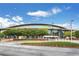 View of Infinite Energy Arena under a blue sky with trees in front at 775 Tribble Cove Dr, Lawrenceville, GA 30045