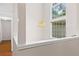 Elegant foyer with high ceilings and a large window, creating a grand and welcoming entrance to the home at 775 Tribble Cove Dr, Lawrenceville, GA 30045