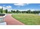 Expansive green space with a brick pathway at 775 Tribble Cove Dr, Lawrenceville, GA 30045