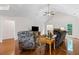 Bright living room with vaulted ceiling, hardwood floors, and fireplace, offering a cozy and inviting atmosphere at 775 Tribble Cove Dr, Lawrenceville, GA 30045