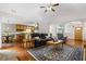 Open-concept living area connected to the kitchen and dining space at 775 Tribble Cove Dr, Lawrenceville, GA 30045
