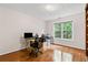 The office space offers hardwood floors and a large window at 775 Tribble Cove Dr, Lawrenceville, GA 30045