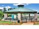 Spacious community pavilion with picnic tables, providing a perfect spot for gatherings and outdoor meals at 775 Tribble Cove Dr, Lawrenceville, GA 30045