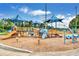 Vibrant playground with multiple play structures, perfect for Gathering fun and outdoor activities at 775 Tribble Cove Dr, Lawrenceville, GA 30045