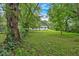 A spacious backyard, surrounded by mature trees at 2326 Brackett Sw St, Marietta, GA 30060