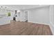 Open-concept floor plan featuring wood-look laminate flooring and lots of light at 2326 Brackett Sw St, Marietta, GA 30060