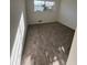 Bedroom with carpet and window at 4701 Flat Shoals Rd # 48B, Union City, GA 30291