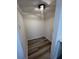 Walk in closet with wood-look floors and a built in light at 4701 Flat Shoals Rd # 48B, Union City, GA 30291