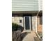Close up of a townhome front door with stone accents and a small porch at 4701 Flat Shoals Rd # 48B, Union City, GA 30291