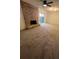 Spacious living room with brick fireplace, ceiling fan, and outdoor access at 4701 Flat Shoals Rd # 48B, Union City, GA 30291