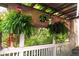 Relaxing back porch with hanging plants and bamboo blinds offers a tranquil and shaded outdoor space at 611 Pickett Se St, Atlanta, GA 30316