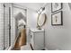 Upstairs bathroom featuring modern fixtures, a shower with white subway tile, and unique decor at 611 Pickett Se St, Atlanta, GA 30316