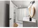 Charming bathroom with hexagon tile floors, and new fixtures at 611 Pickett Se St, Atlanta, GA 30316