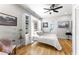 Bedroom with light hardwood floors, ceiling fan and built-in Murphy bed at 611 Pickett Se St, Atlanta, GA 30316