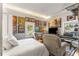 Comfortable bedroom features wall art, musical instruments, windows, and bright LED accent lights at 611 Pickett Se St, Atlanta, GA 30316