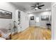 Full bedroom view, Murphy bed, hardwood floors, ceiling fan at 611 Pickett Se St, Atlanta, GA 30316