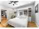 Bright bedroom featuring a Murphy bed with built-in shelving and decor at 611 Pickett Se St, Atlanta, GA 30316